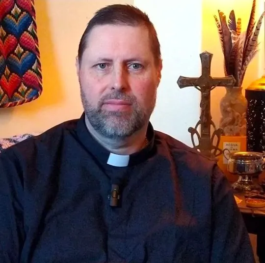 Portrait of Bishop Ashley R. Deutschmann in clerical dress